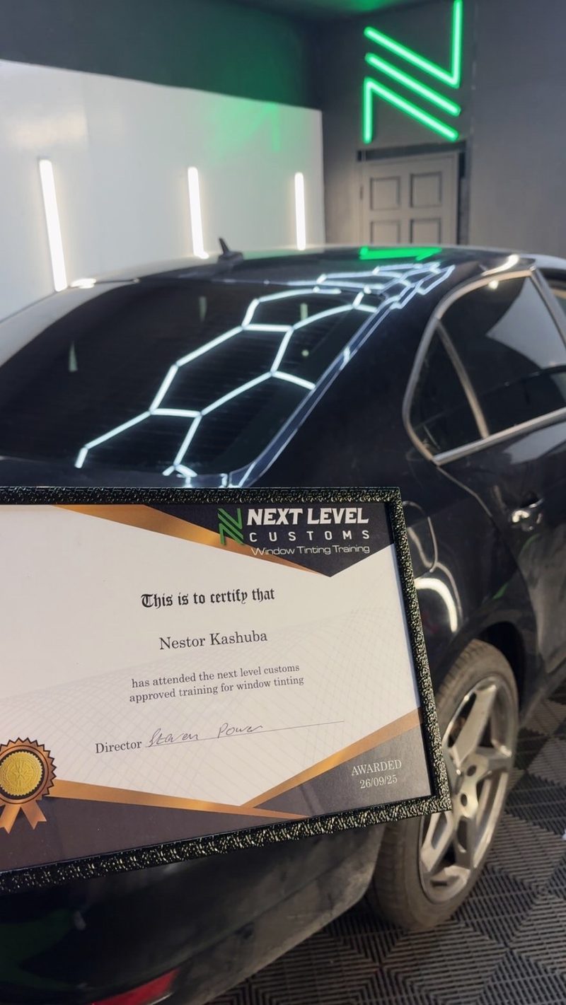 Nestor's window tinting training certificate from Next Level Customs