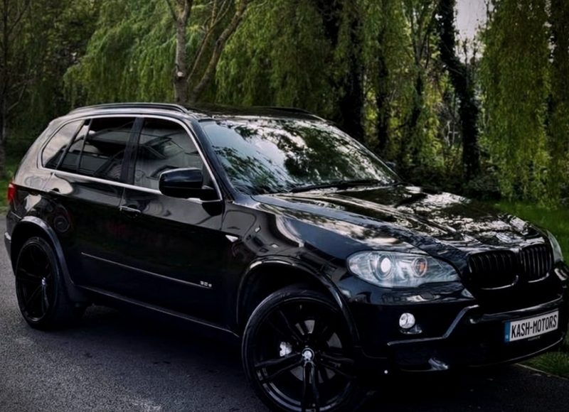Black BMW X5, on the yard